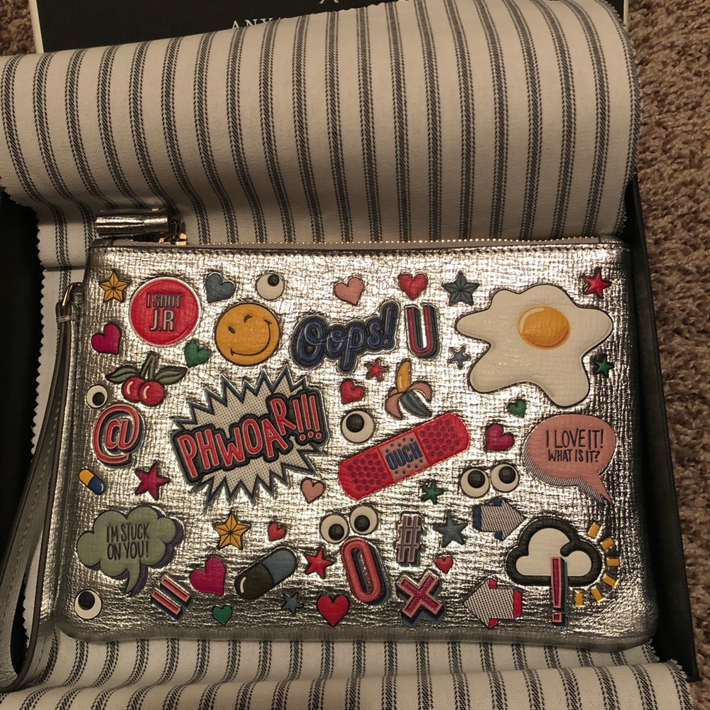 Anya Hindmarch all over stickers silver clutch